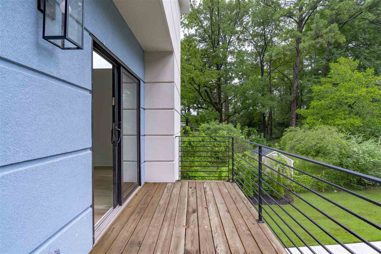 1600 Glendale Avenue Durham, NC 27701 - Photo 18 of 29 a view of balcony with wooden floor and fence