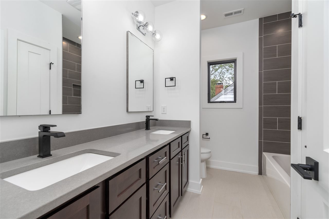 1600 Glendale Avenue Durham, NC 27701 - Photo 23 of 29 a kitchen with a sink and a toilet