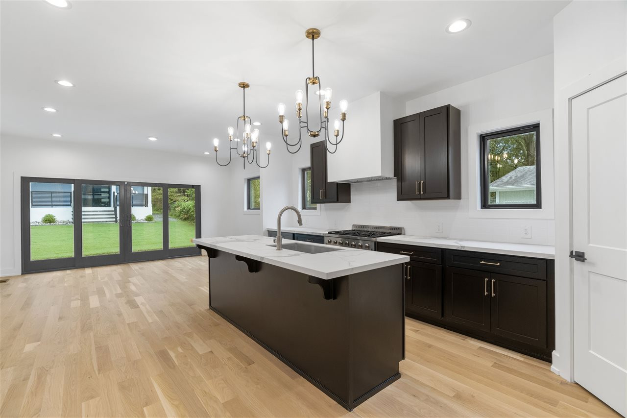 1600 Glendale Avenue Durham, NC 27701 - Photo 3 of 29 a kitchen with a sink and large cabinets