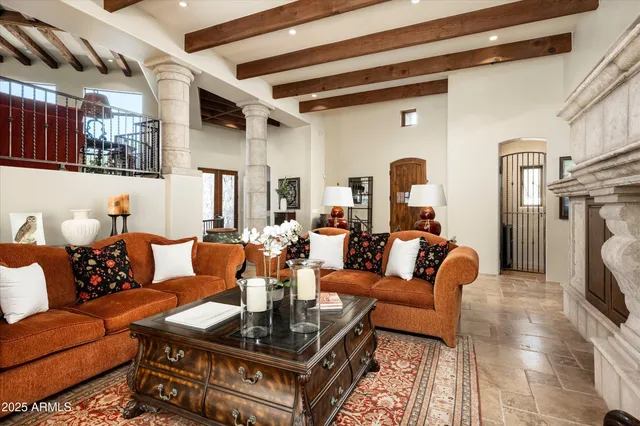 a kitchen with stainless steel appliances granite countertop a sink a stove and a wooden cabinets