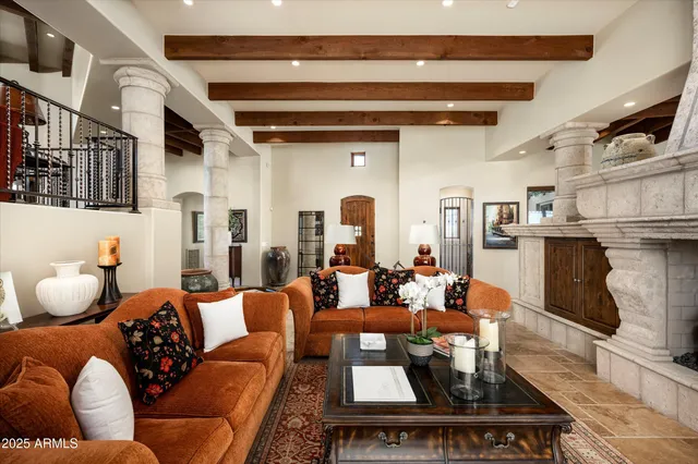 a outdoor living space with patio furniture and a fireplace