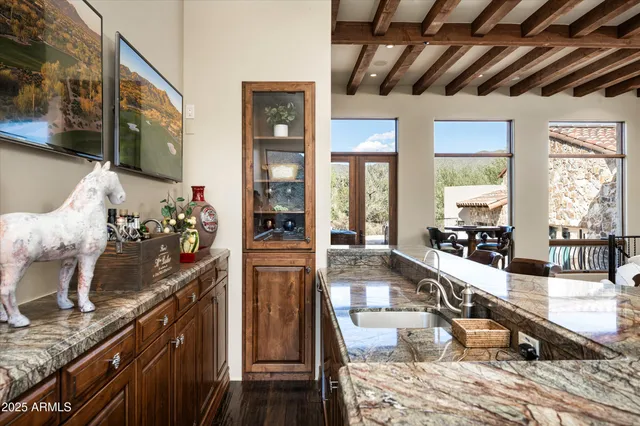 a view of house with swimming pool and porch