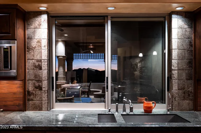 a view of a house with yard porch and sitting area