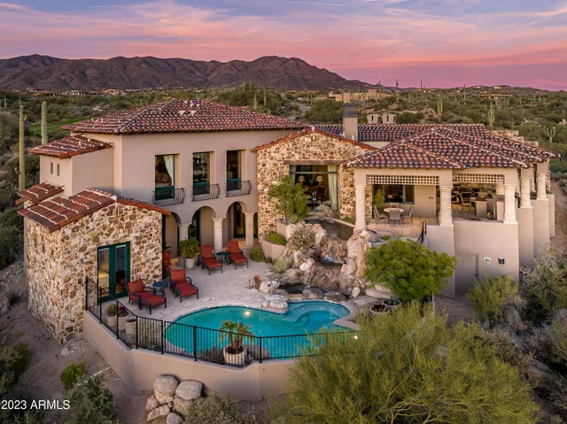 a view of house with outdoor space and mountains