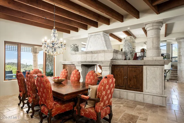 a dinning table and chairs in the patio