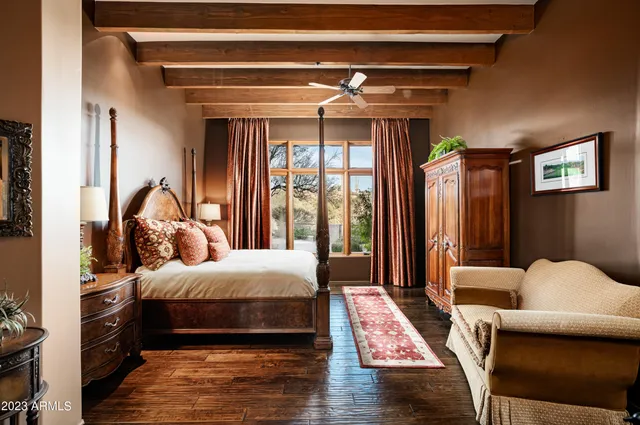 a view of backyard with outdoor seating and green space