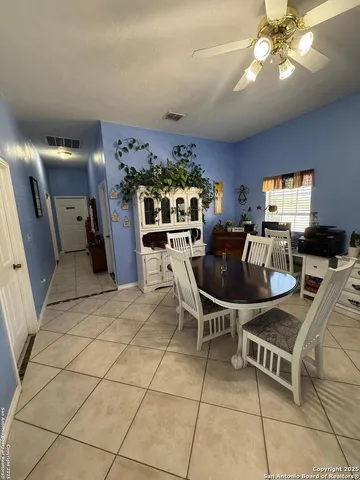 a outdoor space with furniture and chandelier