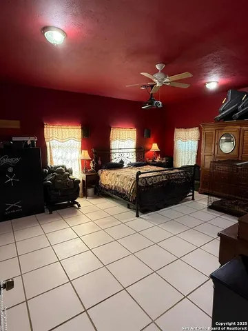 a kitchen with a sink and a large window