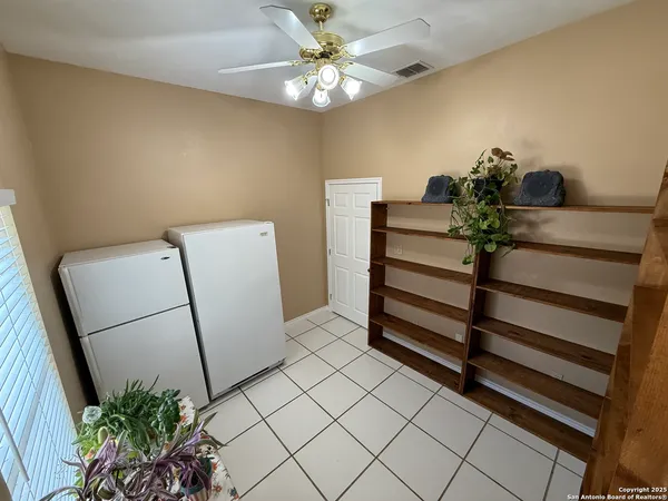 a view of room with window and hardwood floor