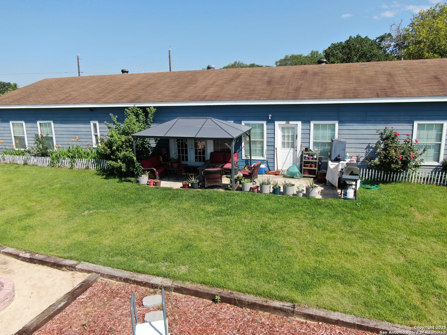 1077 C Road Sutherland Springs, TX 78161 - Photo 42 of 45 a front view of a house with garden