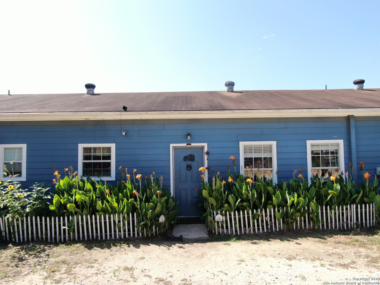1077 C Road Sutherland Springs, TX 78161 - Photo 44 of 45 a front view of a house with a garden