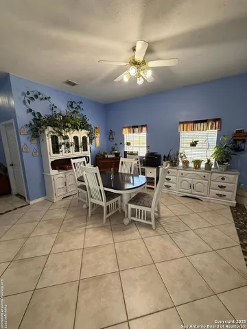 a view of a dining room kitchen and a window