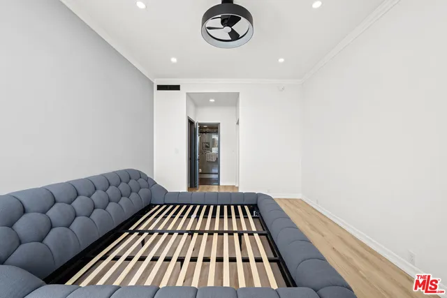 a view of a livingroom with furniture and wooden floor