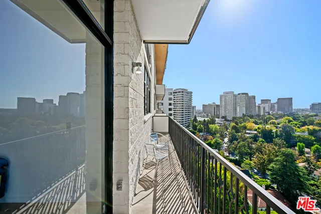 a view of a balcony with an ocean view