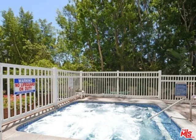 a bathroom with sinks and a mirror