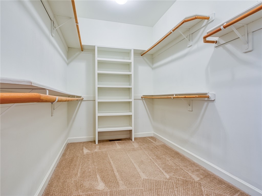 7914 O Neil Road Gloucester, VA 23061 - Photo 22 of 47 Walk in closet featuring light colored carpet