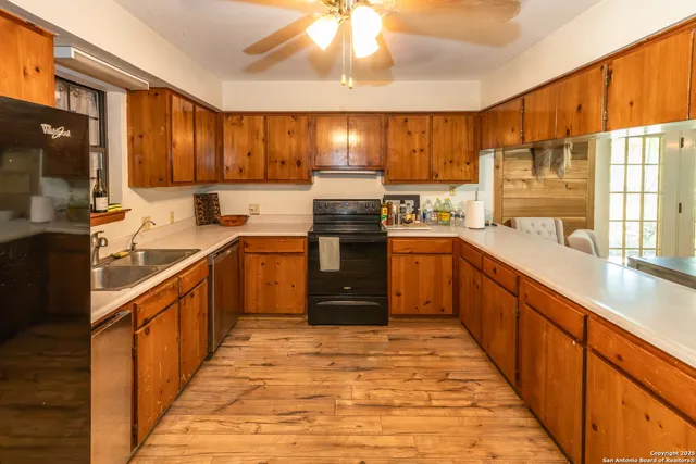 a bedroom with a bed and a television