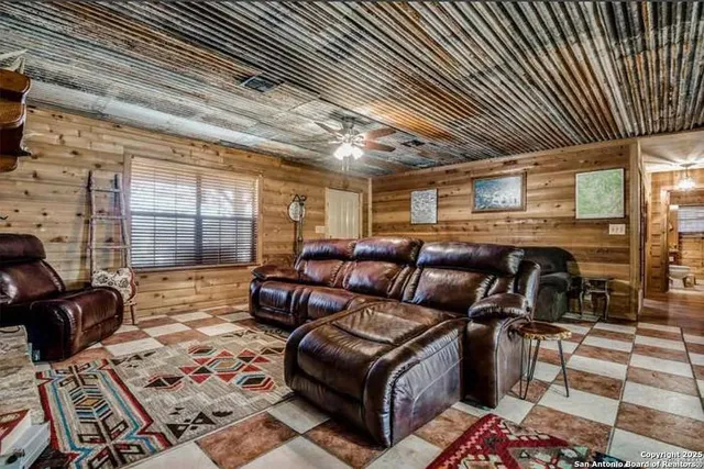a kitchen with lots of counter top space appliances and cabinets