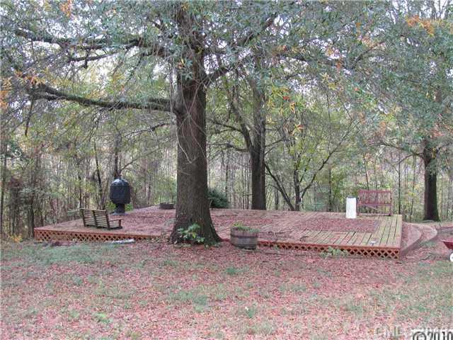 3902 Watson Church Road Monroe, NC 28110 - Photo 11 of 13 a view of a tree in a yard