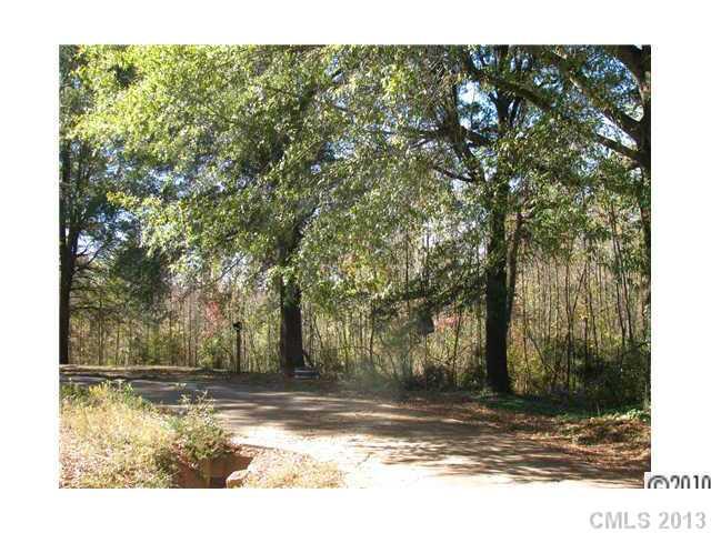 3902 Watson Church Road Monroe, NC 28110 - Photo 12 of 13 a view of a yard with trees