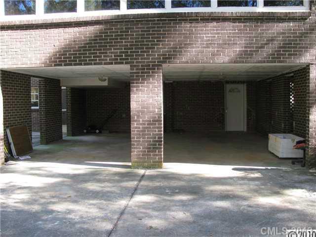 3902 Watson Church Road Monroe, NC 28110 - Photo 13 of 13 a view of a brick house with a outdoor space