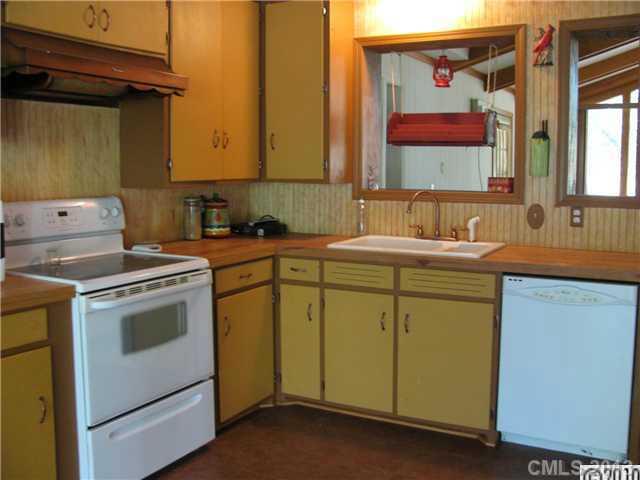 3902 Watson Church Road Monroe, NC 28110 - Photo 4 of 13 a utility room with sink dryer and washer