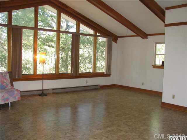 3902 Watson Church Road Monroe, NC 28110 - Photo 5 of 13 a view of an empty room with a window