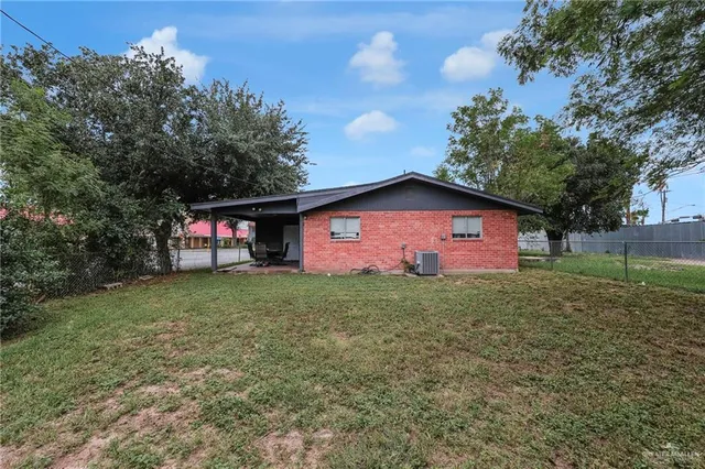 a view of a backyard with a garden