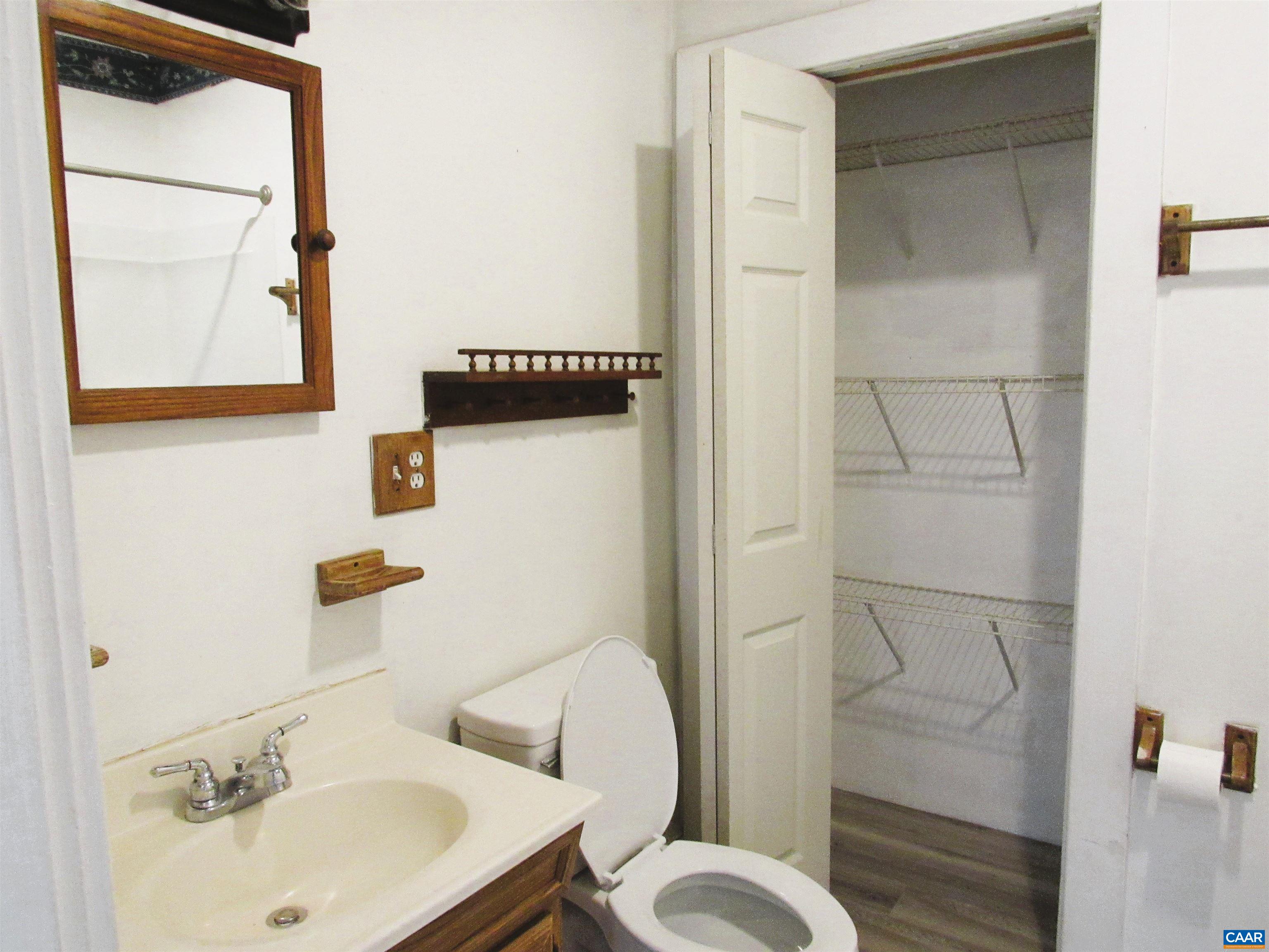 1358 South Coolwell Road Madison Heights, VA 24572 - Photo 13 of 27 a bathroom with a sink toilet and shower