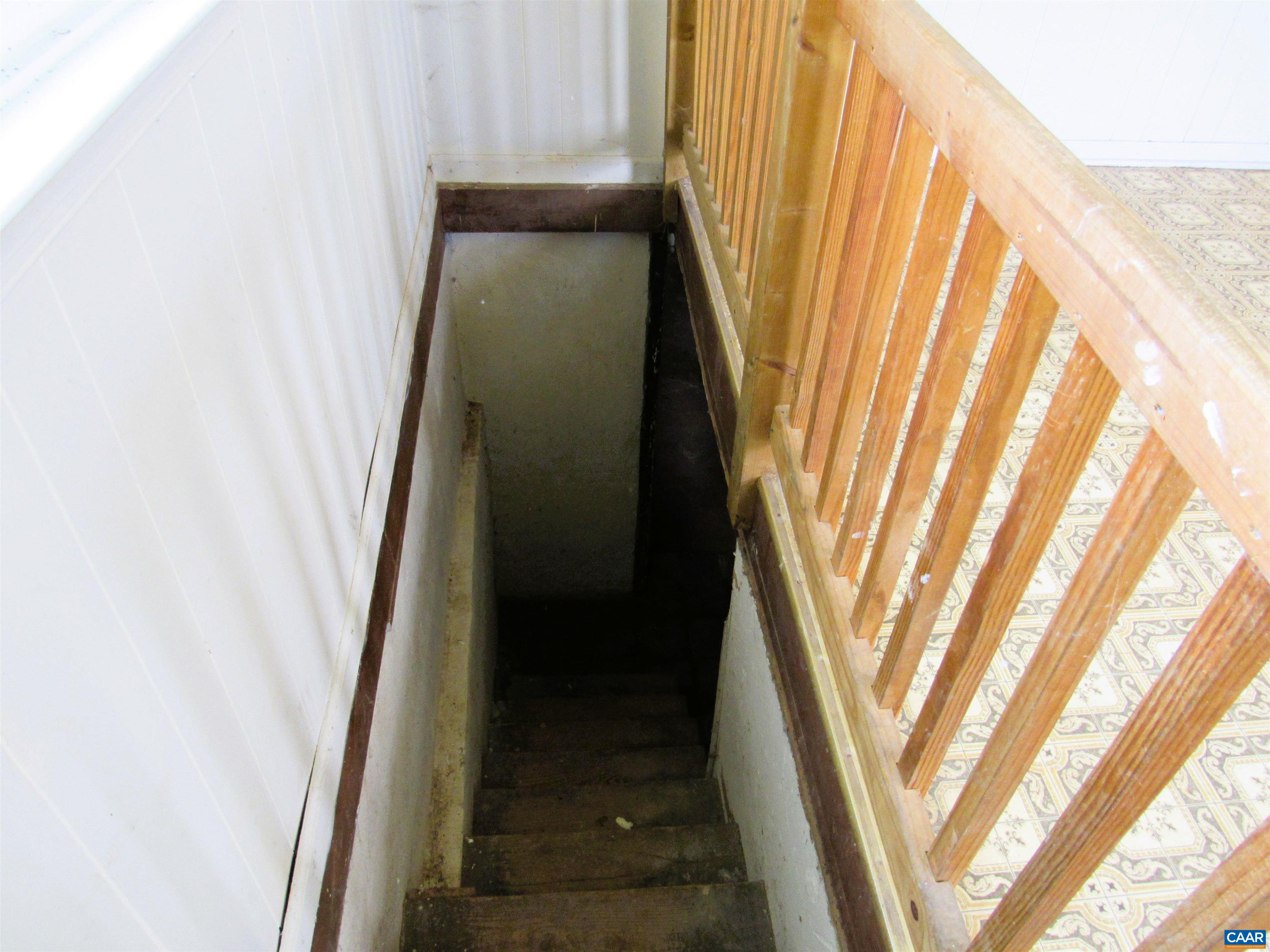 1358 South Coolwell Road Madison Heights, VA 24572 - Photo 17 of 27 a view of staircase with railing and white walls