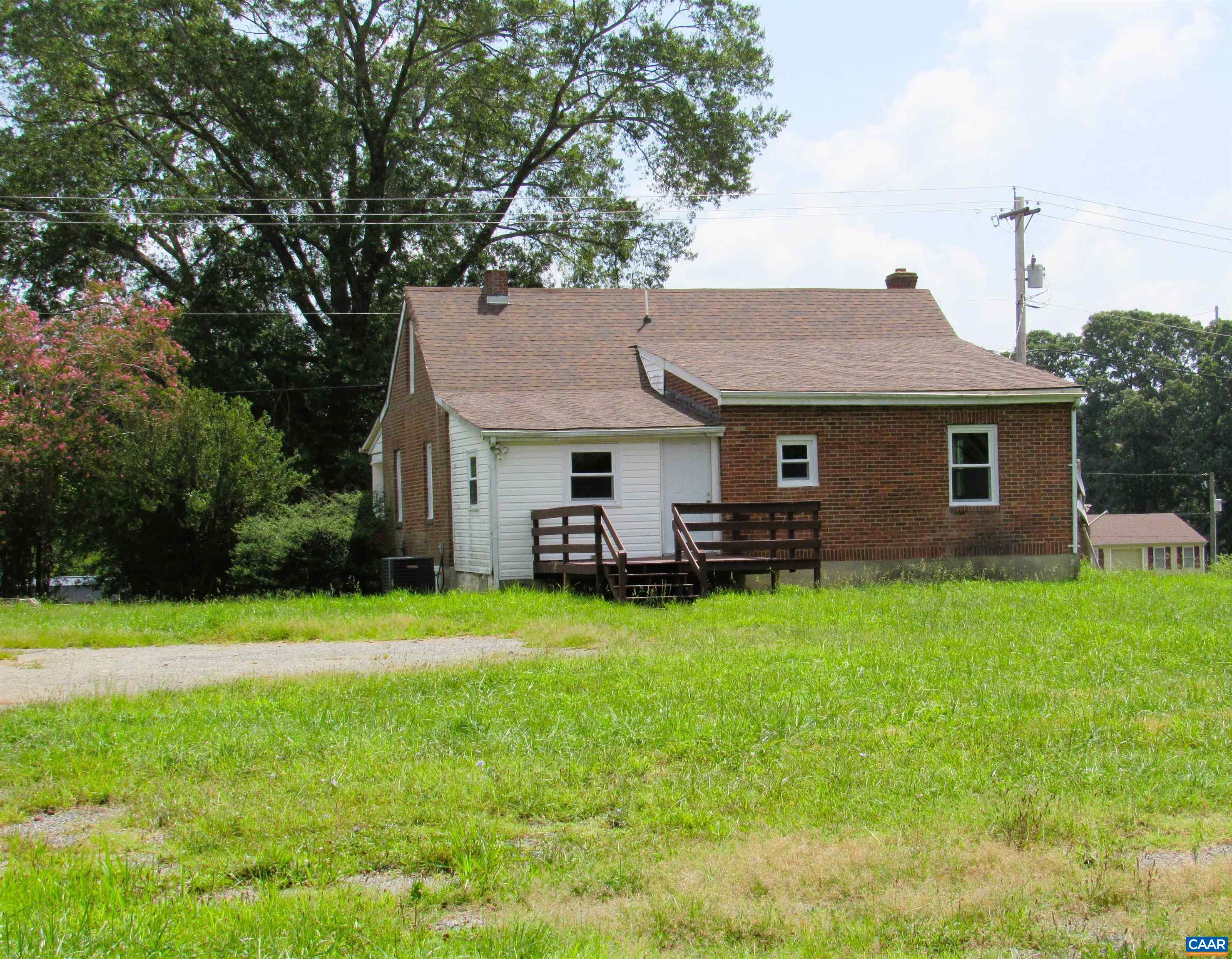 1358 South Coolwell Road Madison Heights, VA 24572 - Photo 4 of 27 a front view of a house with yard and green space