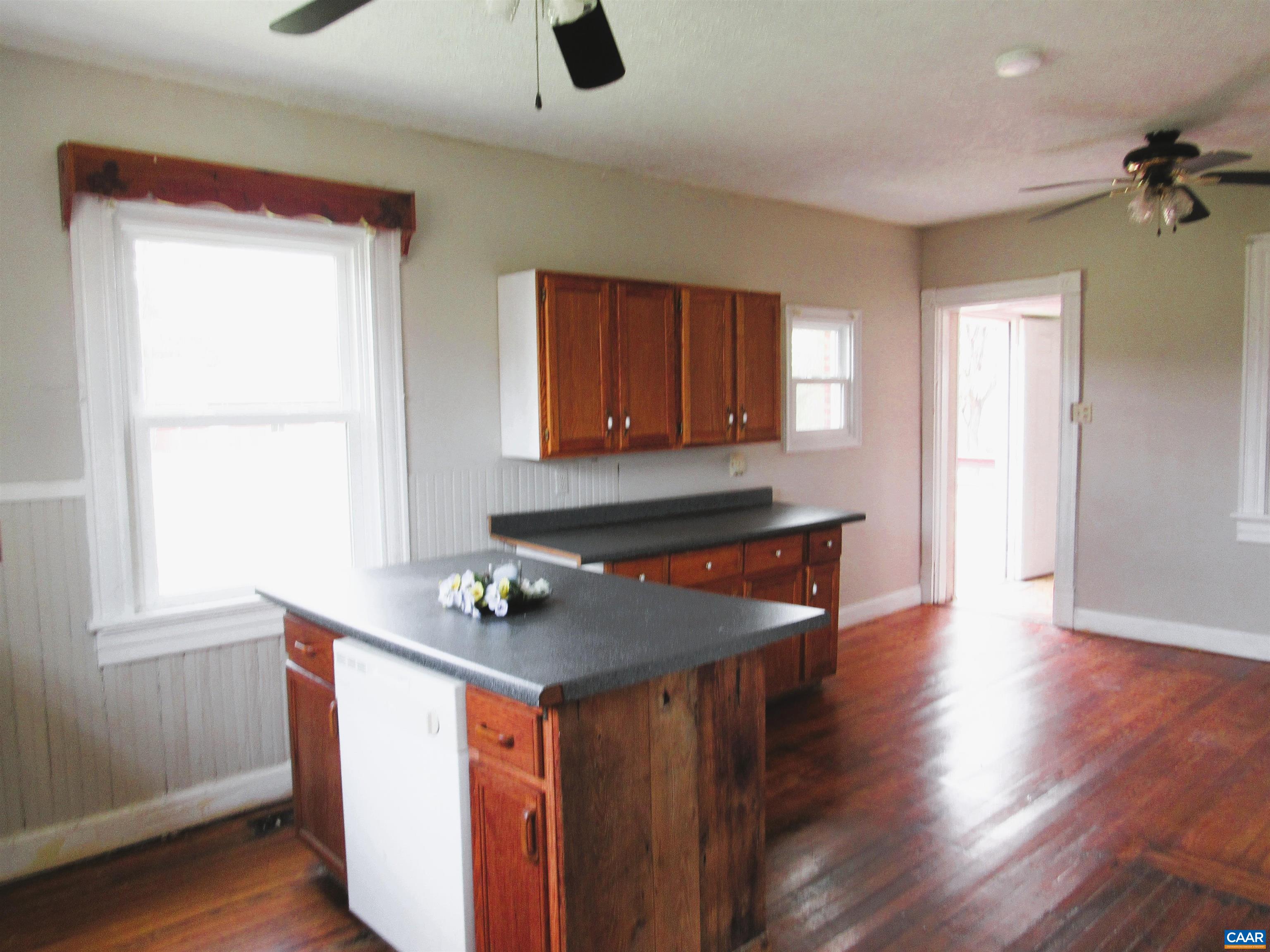 1358 South Coolwell Road Madison Heights, VA 24572 - Photo 8 of 27 a room with wooden floor and window