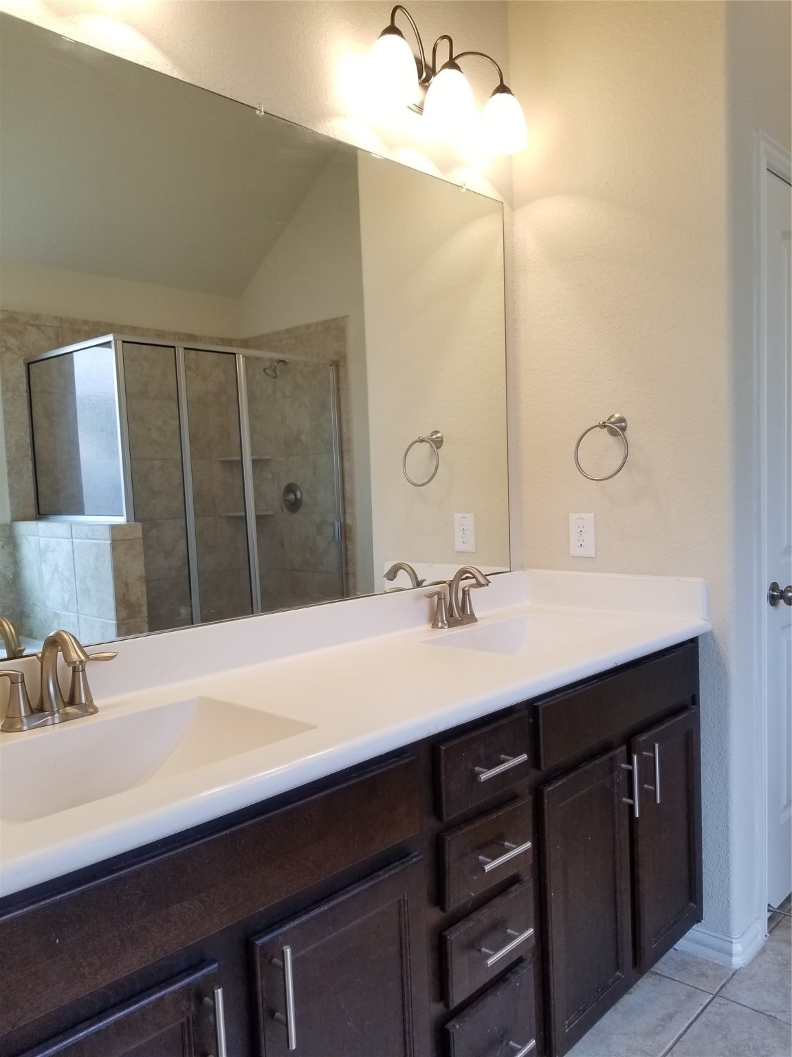 5217 Green Heath Lane Rosharon, TX 77583 - Photo 12 of 18 a bathroom with a sink and a mirror