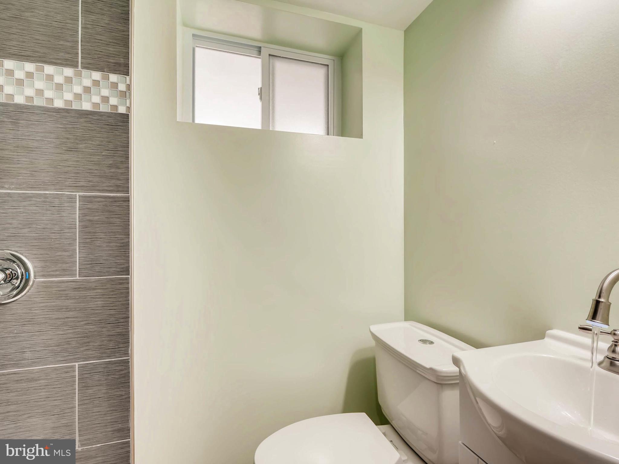 613 Queensgate Road Baltimore, MD 21229 - Photo 26 of 30 Basement Bathroom