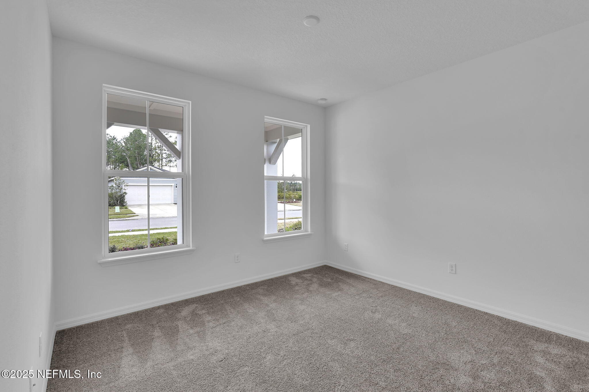525 Continuum Loop Yulee, FL 32097 - Photo 19 of 44 Mystique Secondary Bedroom