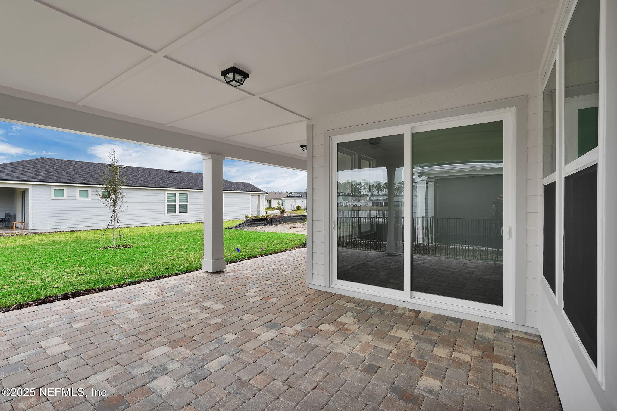 525 Continuum Loop Yulee, FL 32097 - Photo 21 of 44 Mystique Covered Lanai