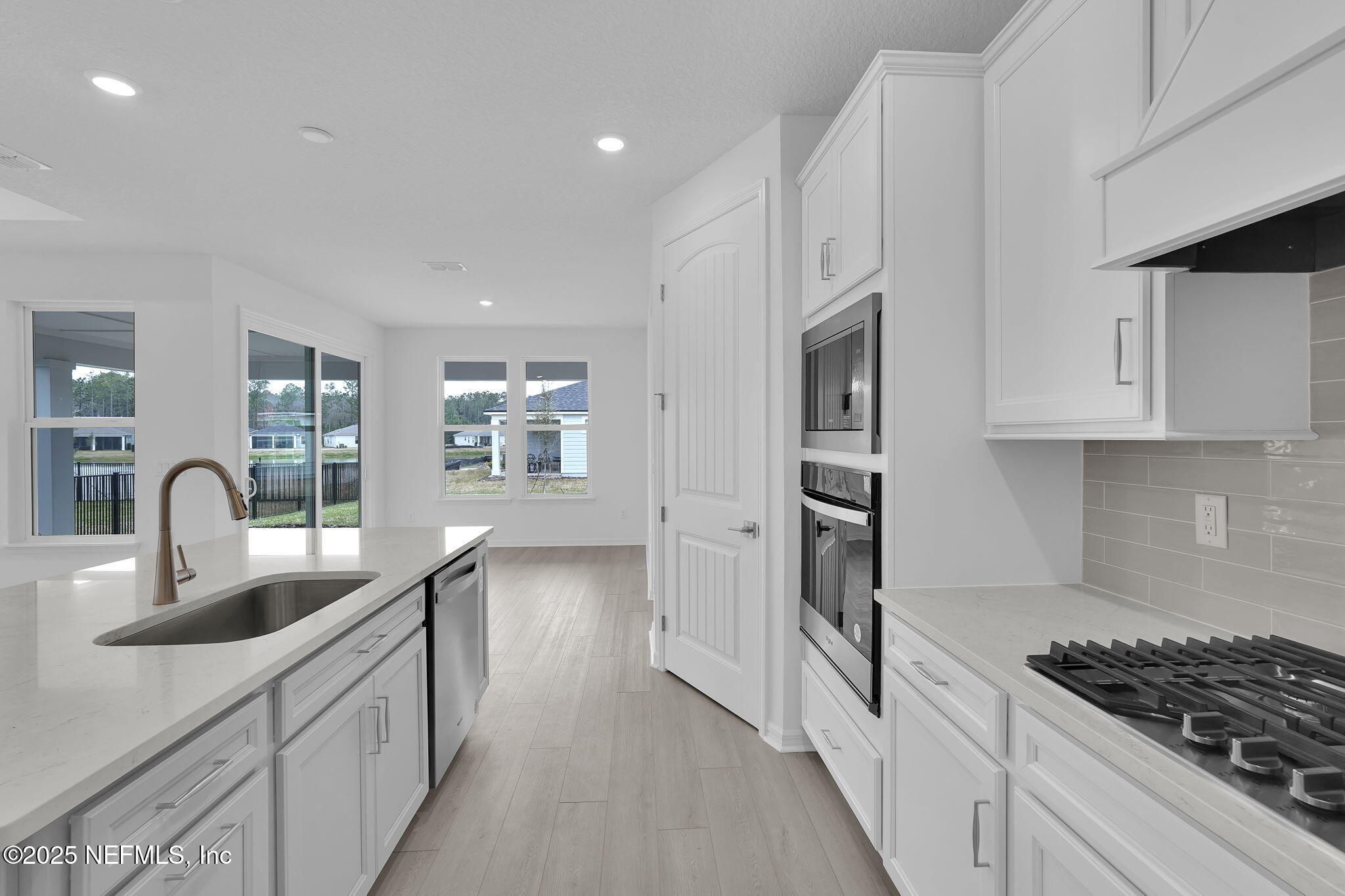 525 Continuum Loop Yulee, FL 32097 - Photo 6 of 44 Mystique Kitchen