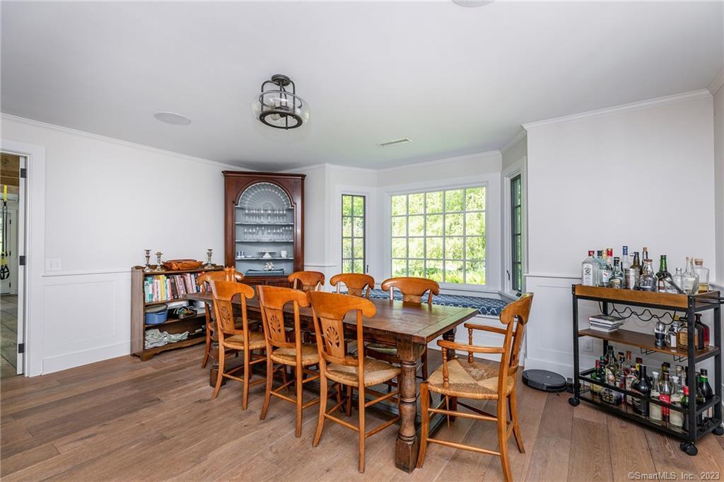 90 Sharon Mountain Road Sharon, CT 06069 - Photo 12 of 23 a view of a dining room with furniture window and wooden floor