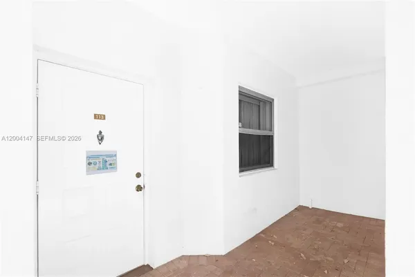 a view of an empty room with window