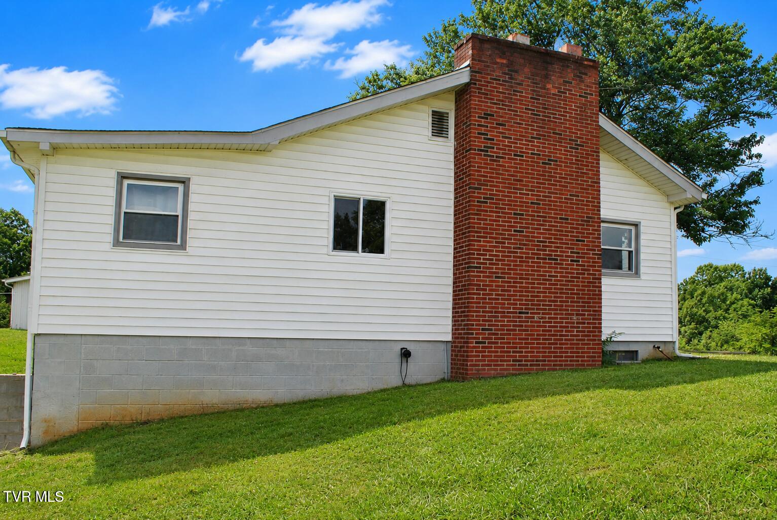 710 Colvert Road Mosheim, TN 37818 - Photo 3 of 57 Side view 3