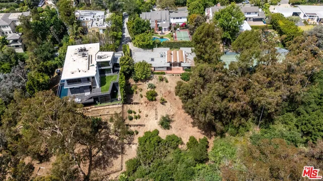 an aerial view of residential house with parking space
