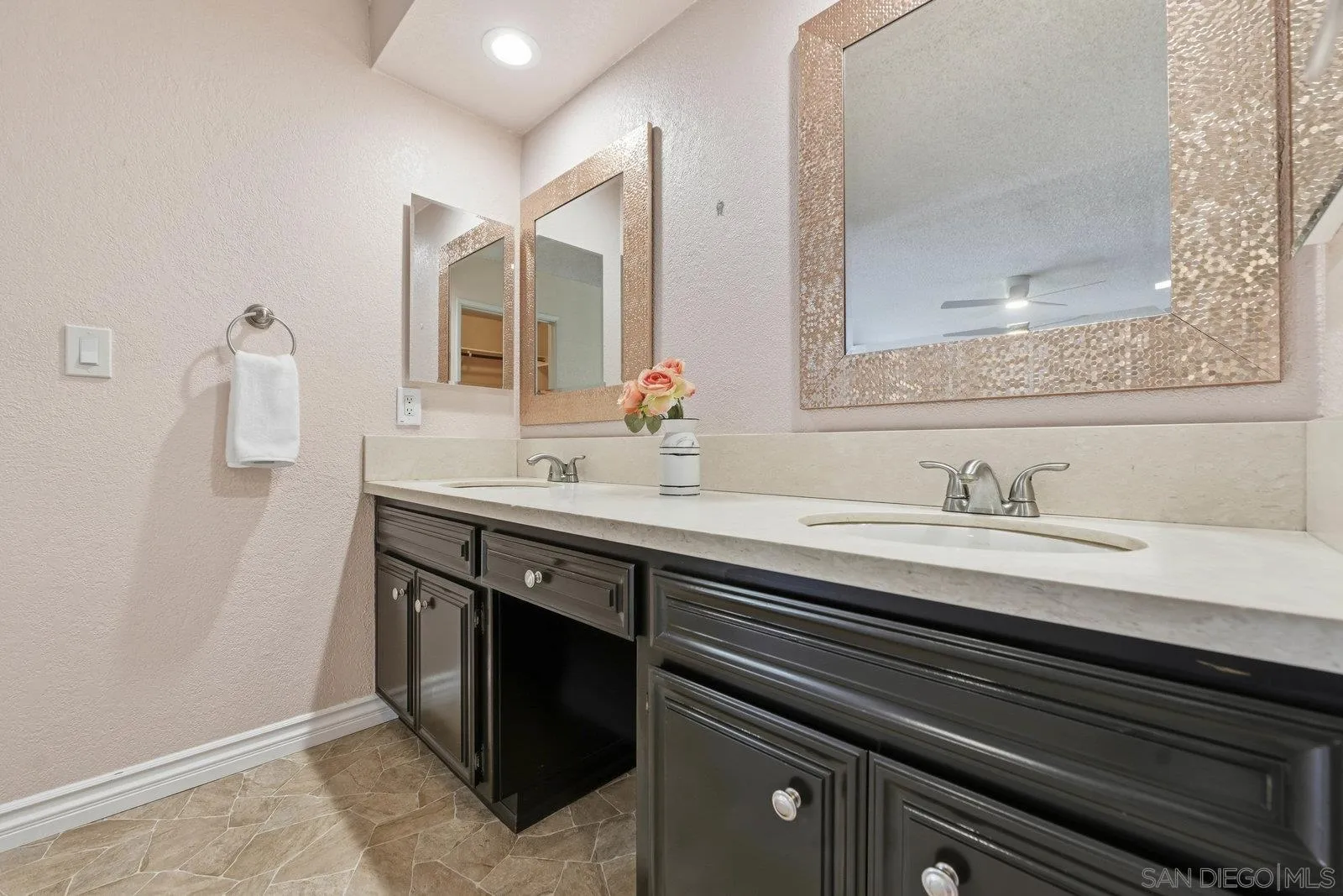 16120 Poderio Court Ramona, CA 92065 - Photo 26 of 38 a bathroom with a sink and a mirror