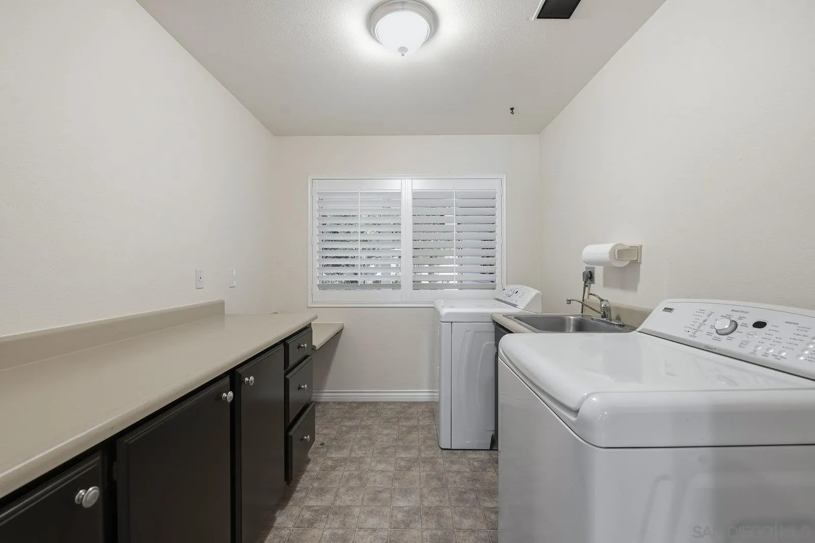 16120 Poderio Court Ramona, CA 92065 - Photo 31 of 38 a utility room with dryer and washer