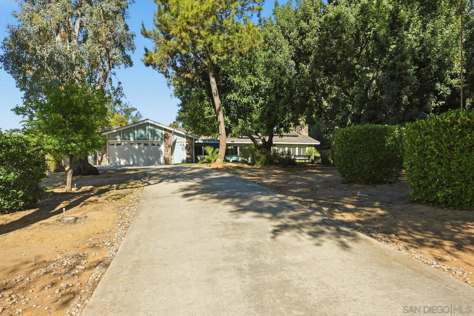 16120 Poderio Court Ramona, CA 92065 - Photo 4 of 38 a view of a street with houses