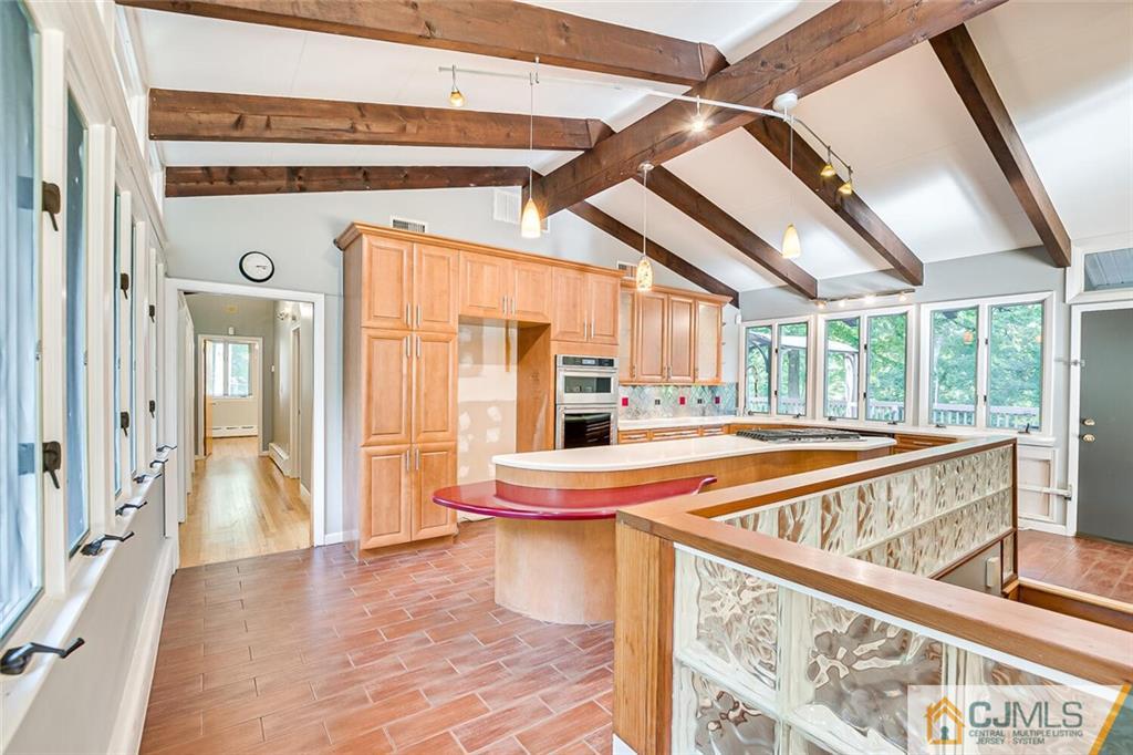 33 Davidson's Mill Road North Brunswick, NJ 08902 - Photo 32 of 58 a view of a porch with wooden floor and furniture