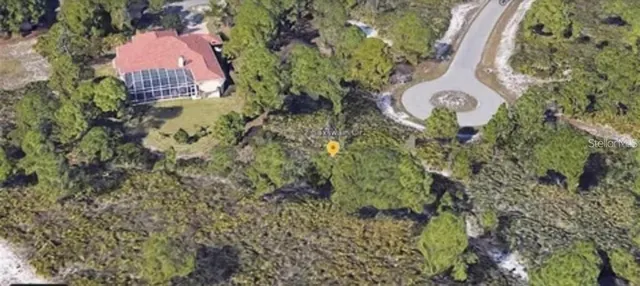 a view of a lake with a building in the background