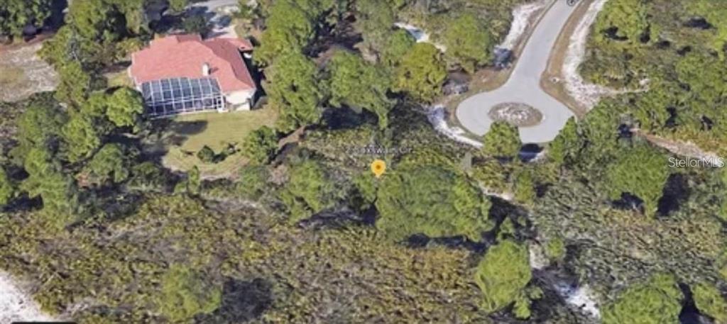2 Coxswain Circle Placida, FL 33946 - Photo 4 of 5 an aerial view of a house with garden space and street view