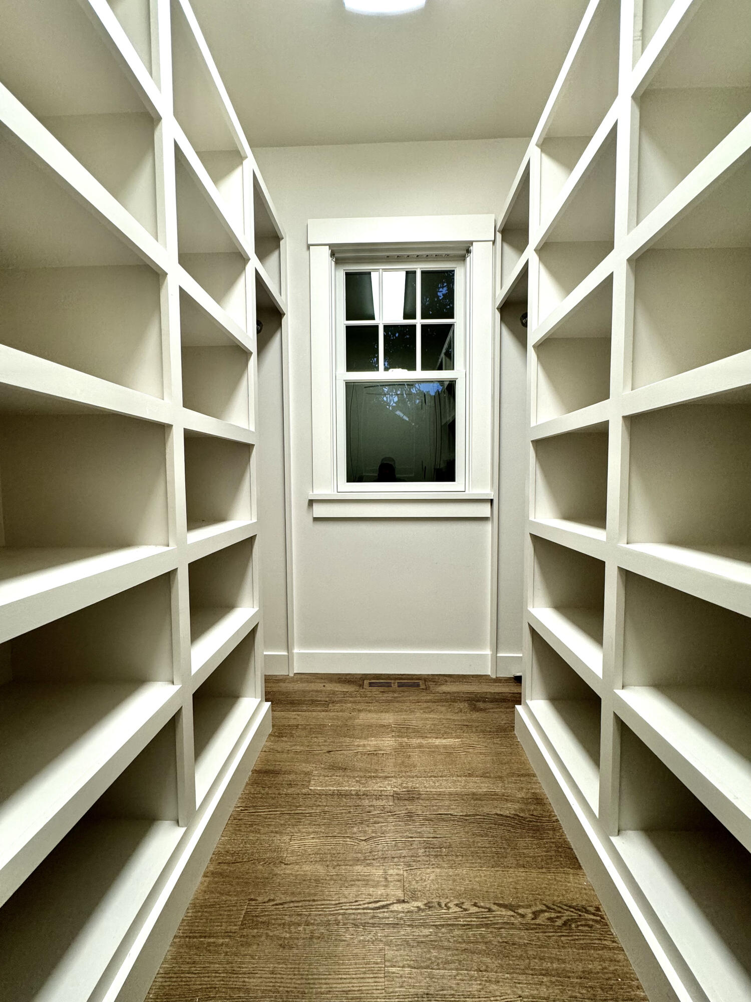 107 Summersea Road Mashpee, MA 02649 - Photo 15 of 29 a view of an empty room with empty shelves