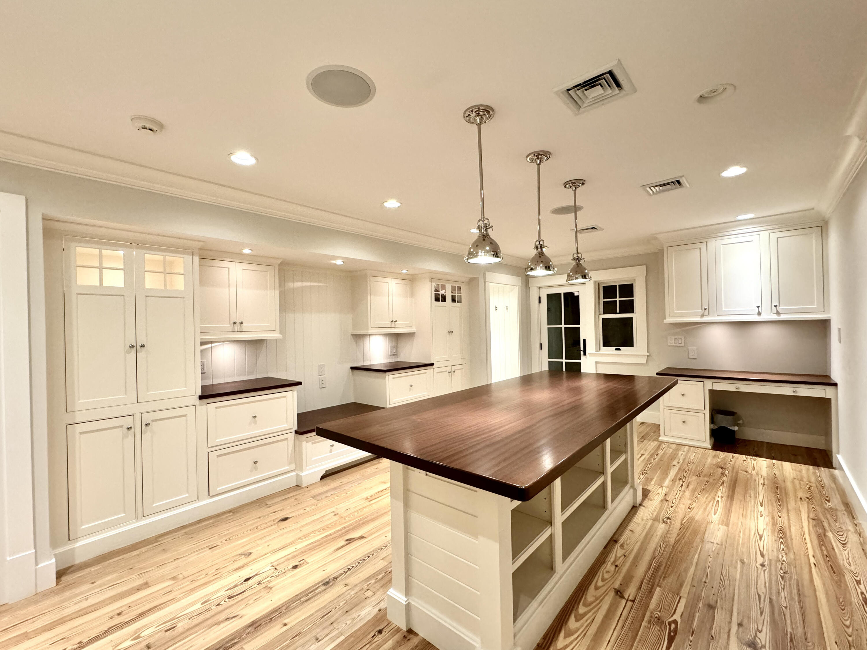 107 Summersea Road Mashpee, MA 02649 - Photo 20 of 29 a kitchen with a refrigerator a sink and wooden floor