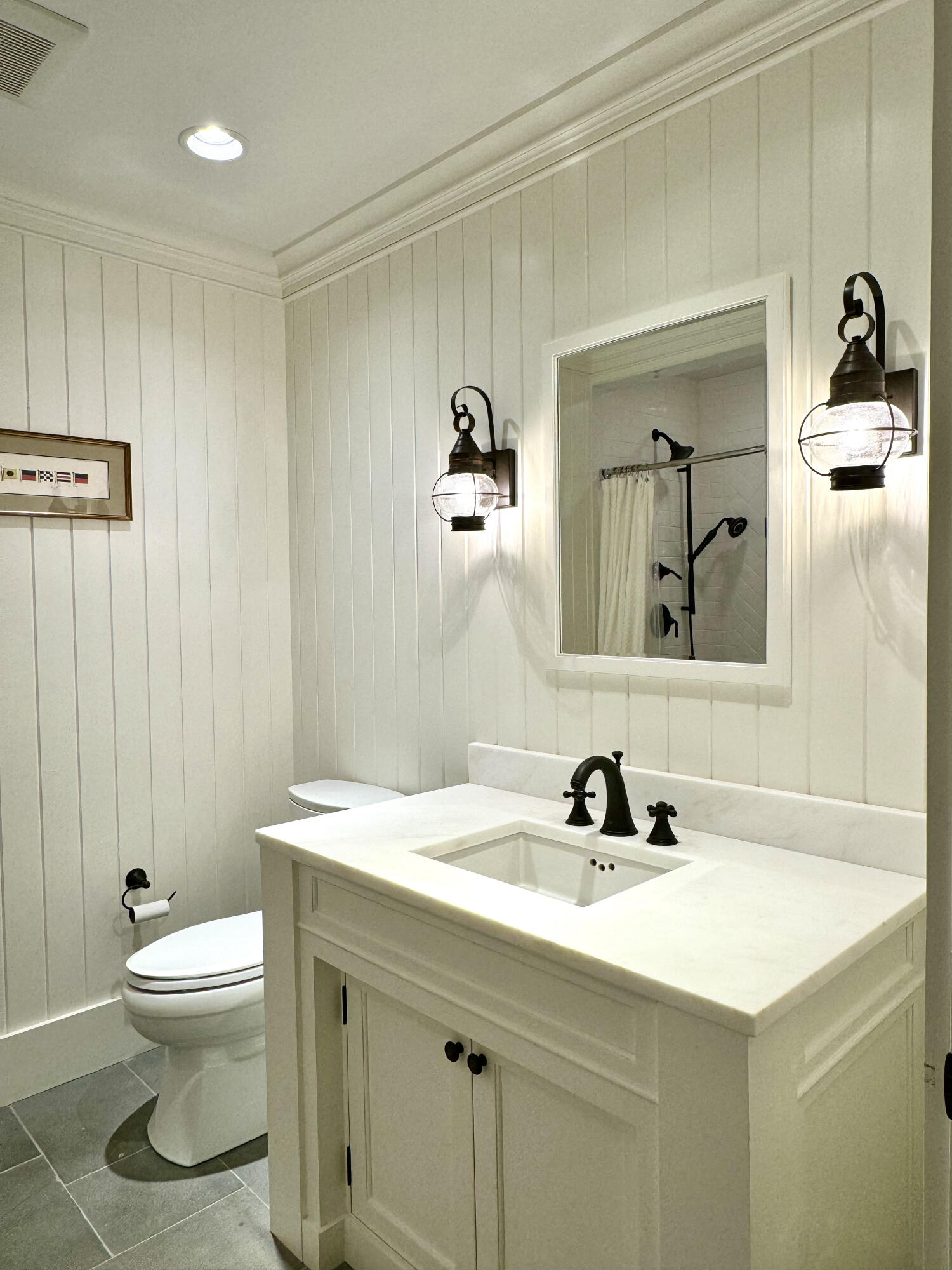 107 Summersea Road Mashpee, MA 02649 - Photo 21 of 29 a bathroom with a sink a toilet and mirror